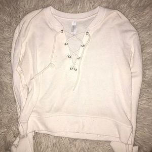 Cropped criss cross sweater